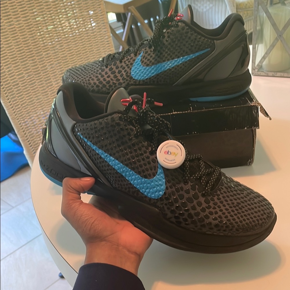 Nike Black Sneakers with Blue Highlights